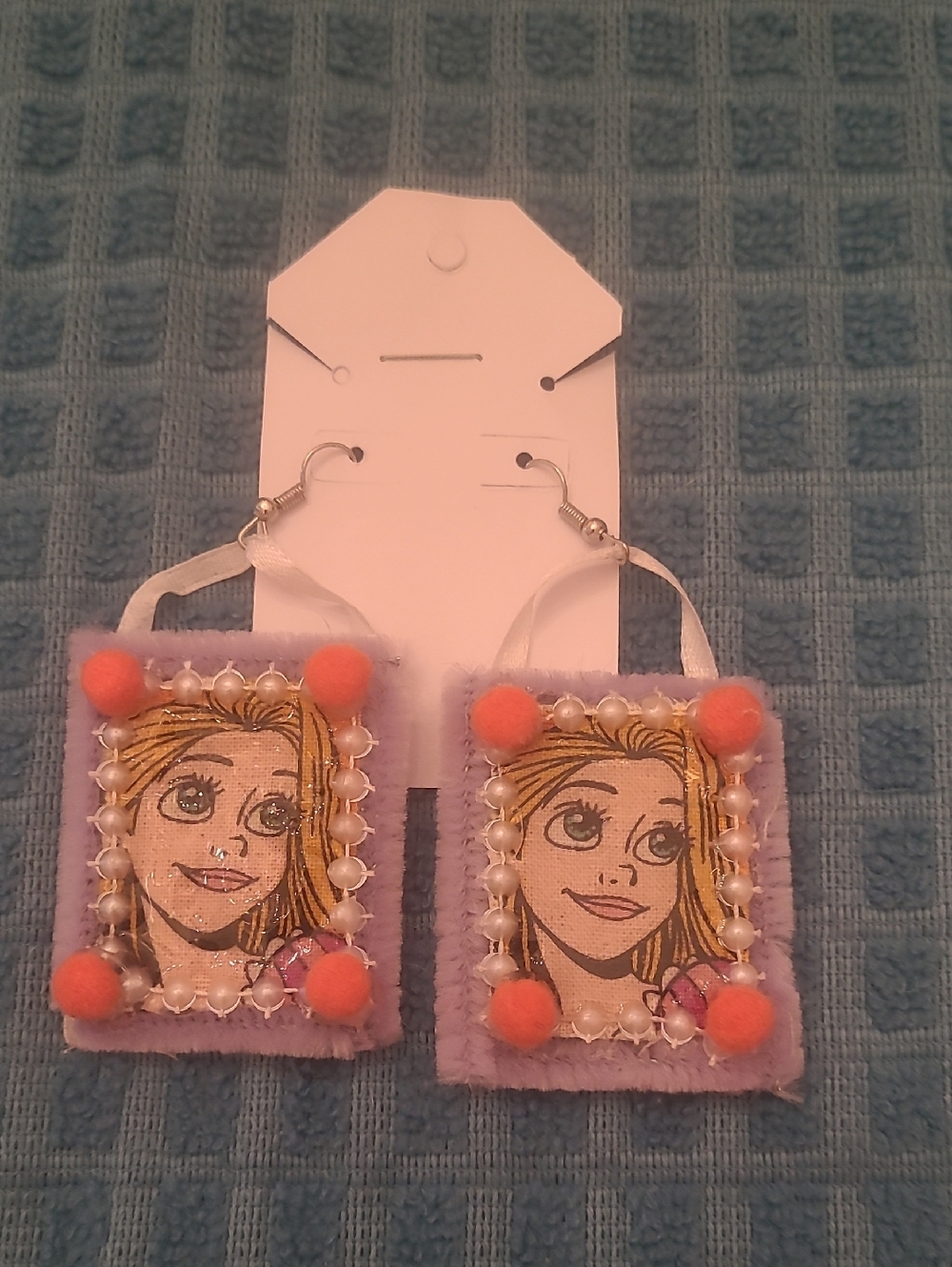 Playful Purple Felt Drop Earrings with Orange Pom Accents
